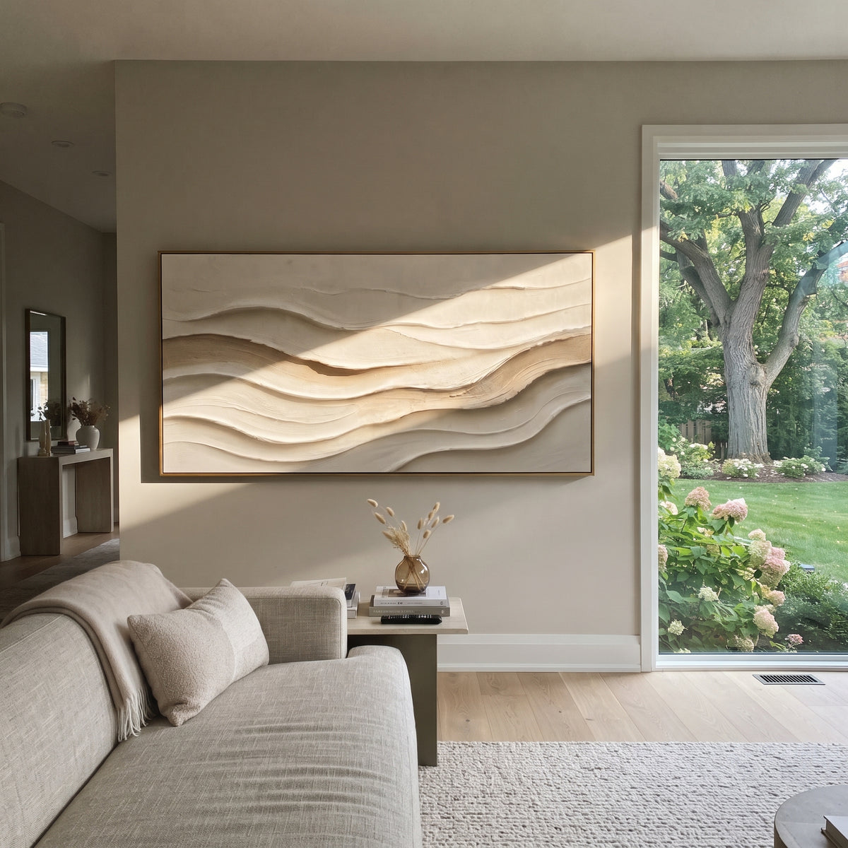 Earthtone Wind Line Relief focuses on white, beige, grey raised plaster waves with folded contour bands, soft dune-like ridges, and quiet negative space across the panoramic composition, keeping the product description tied to the visible artwork rather than a generic texture category. The composition is built from layered ridges, carved plaster edges, curved bands, granular breaks, and raised channels that move across the canvas with a clear directional rhythm. Pale passages, darker accents