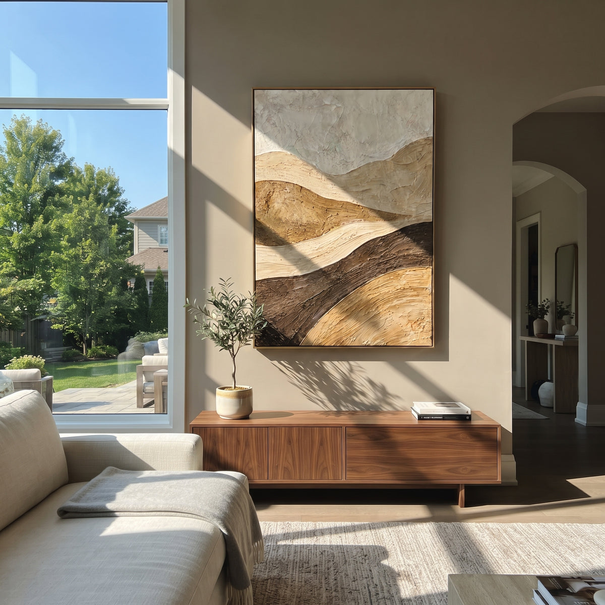 Flowing Rugged Slope Relief focuses on beige, white, brown sedimentary landscape layers with rugged plaster ledges, canyon-like strata, and tactile earth-toned ridges, keeping the product description tied to the visible artwork rather than a generic texture category. The composition is built from layered ridges, carved plaster edges, curved bands, granular breaks, and raised channels that move across the canvas with a clear directional rhythm. Pale passages, darker accents, warm neutral tones